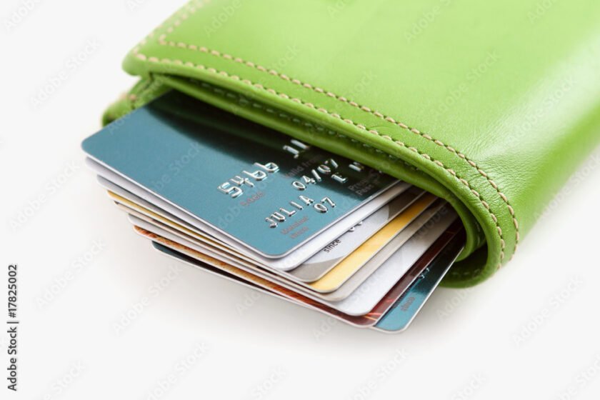 Green Wallet Stuffed with Credit Cards